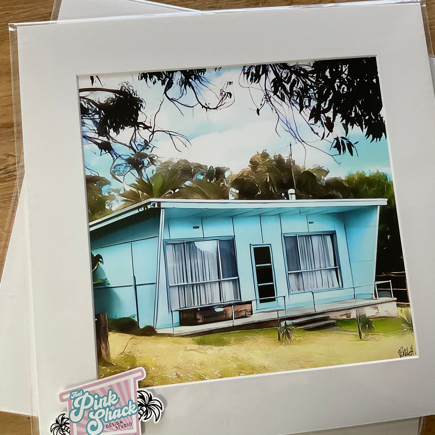 An original mid century blue beach shack in Waratah Bay print picture In mat