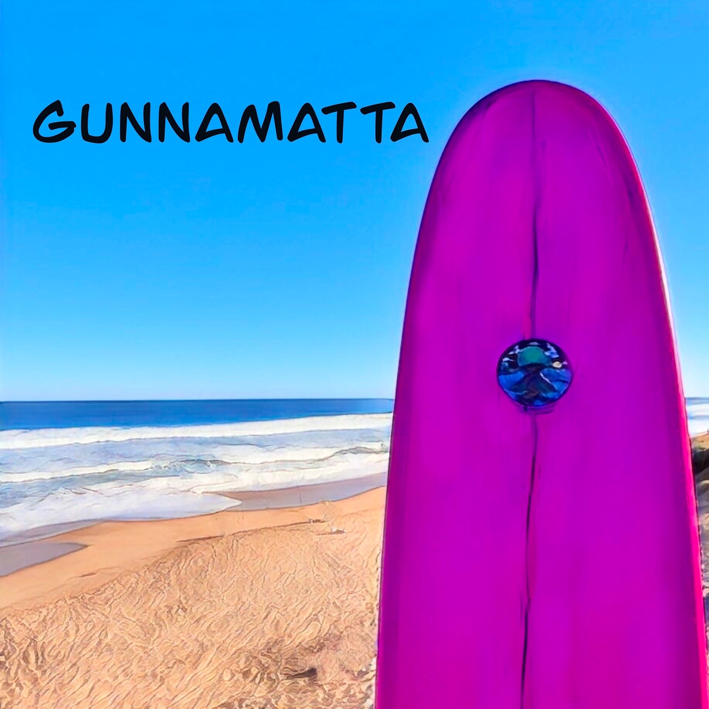A fridge magnet with a pink surfboard overlooking the surf at gunnamatta beach Mornington peninsula