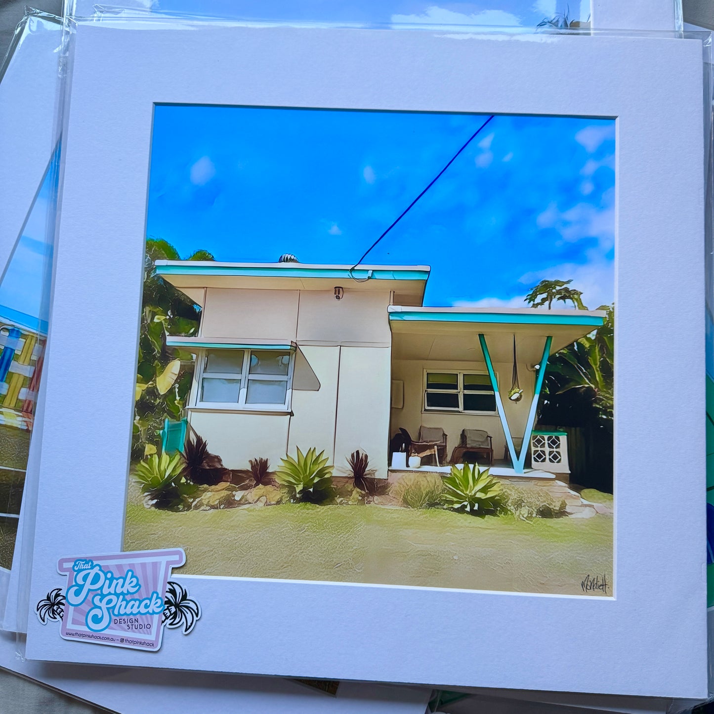 Iconic yellow fibro beach shack in Noosa australia unframed print in mat