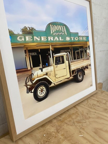 Large oonya general store print in oak frame with mat