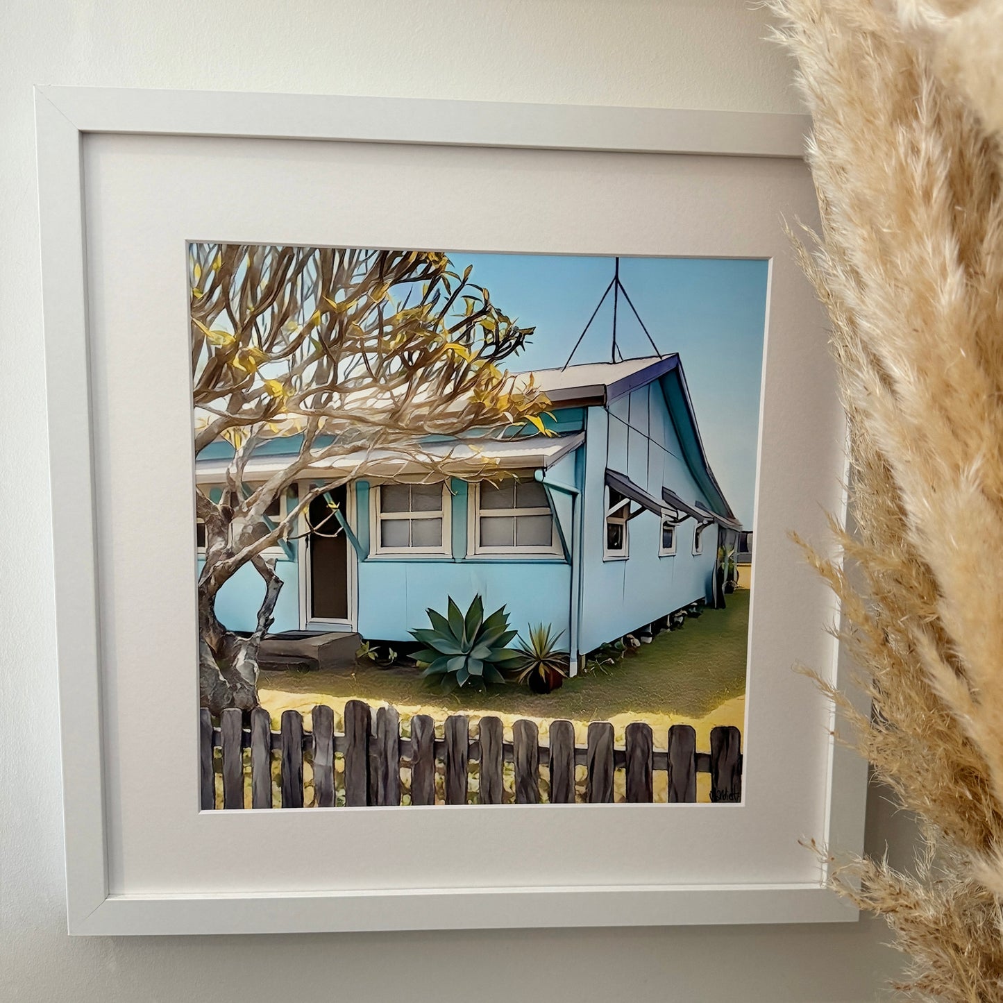 A print wth mat framed of a cool beach surf shack in Lennox head