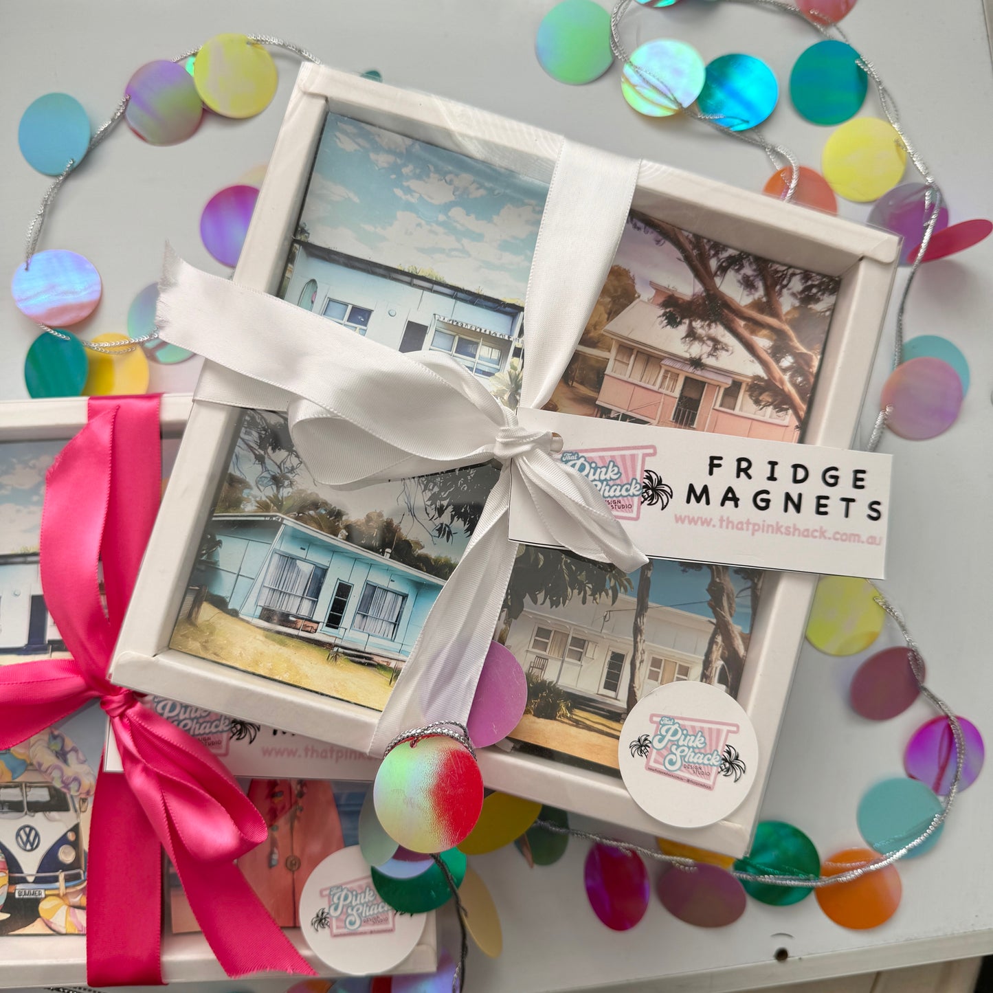 Set of four fridge magnets in a gift box with a ribbon Four fibro beauties Surf shack, Pretty in pink shack, Waratah Bay blue fibro, That White shack