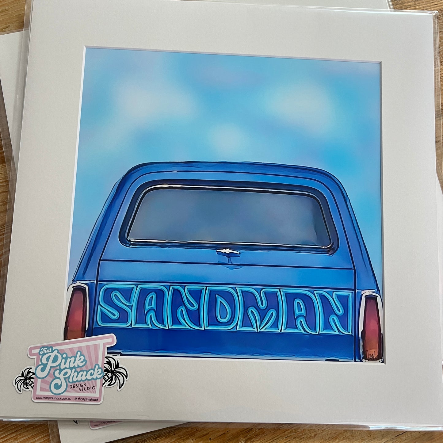 A classic blue 1970’s Holden Sandman Panelvan surf birthday matted print great for the man cave
