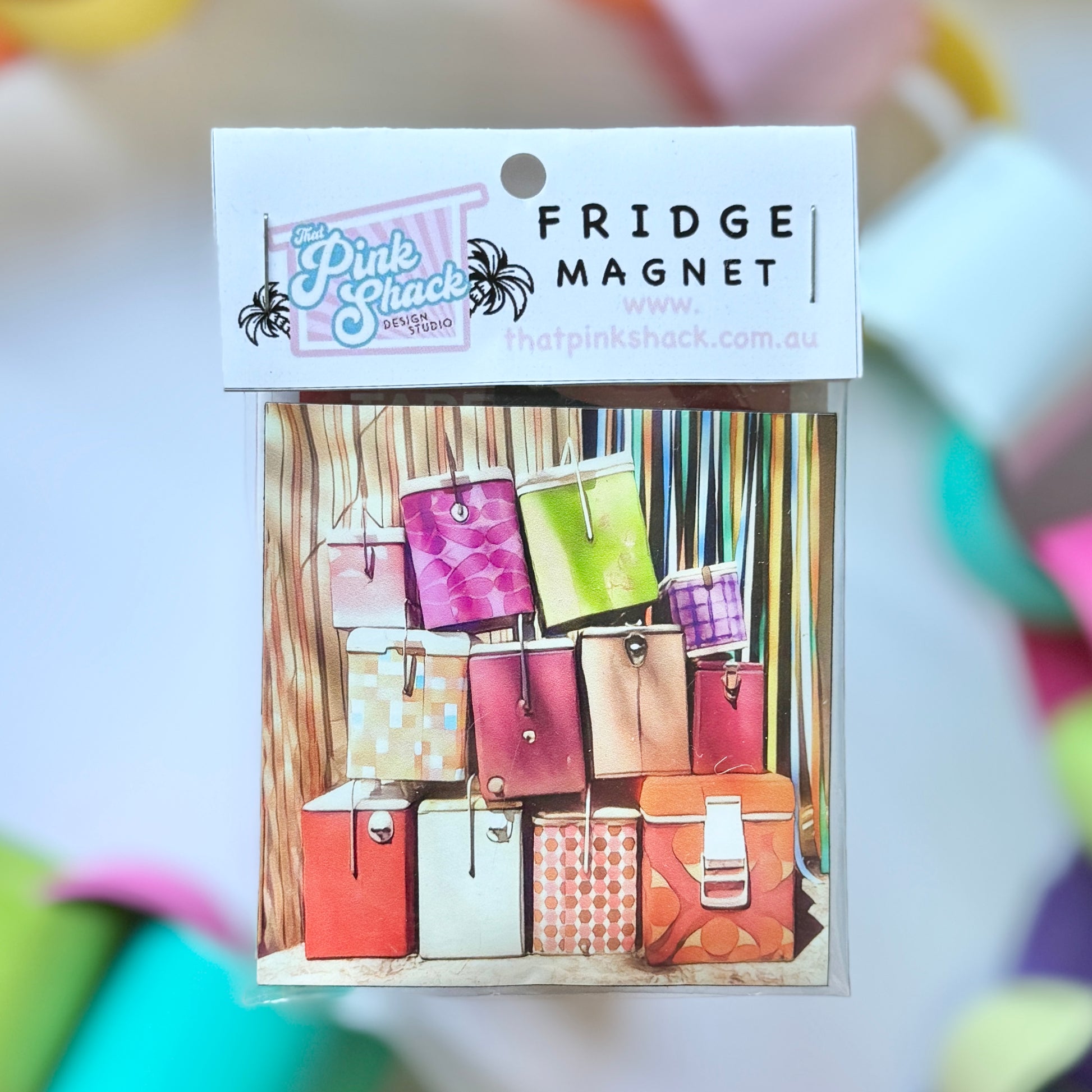 A bunch of vintage retro eskies staked on top of each other outside a caravan annexe fridge magnet in packaging
