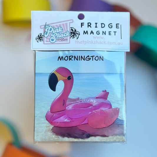 An inflatable flamingo on the beach Mornington Victoria fridge magnet In packaging