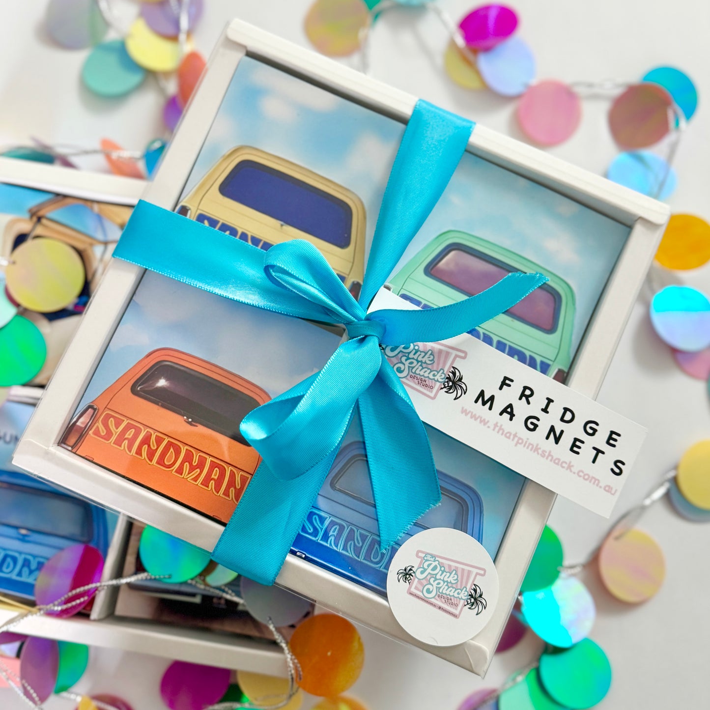 set of four different colour Holden sandman magnets in a gift box With ribbon