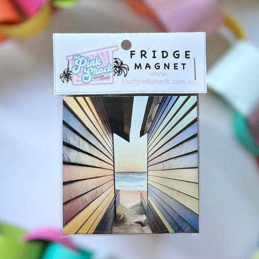 A fridge Magnet of some pastel boatsheds on the mornington peninsula in packaging