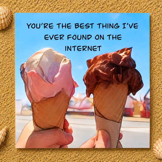 A square greeting card featuring two illustrated ice cream cones held in hands under the text 'YOU'RE THE BEST THING I'VE EVER FOUND ON THE INTERNET', set against a sandy textured background with small seashell decorations in the corners.